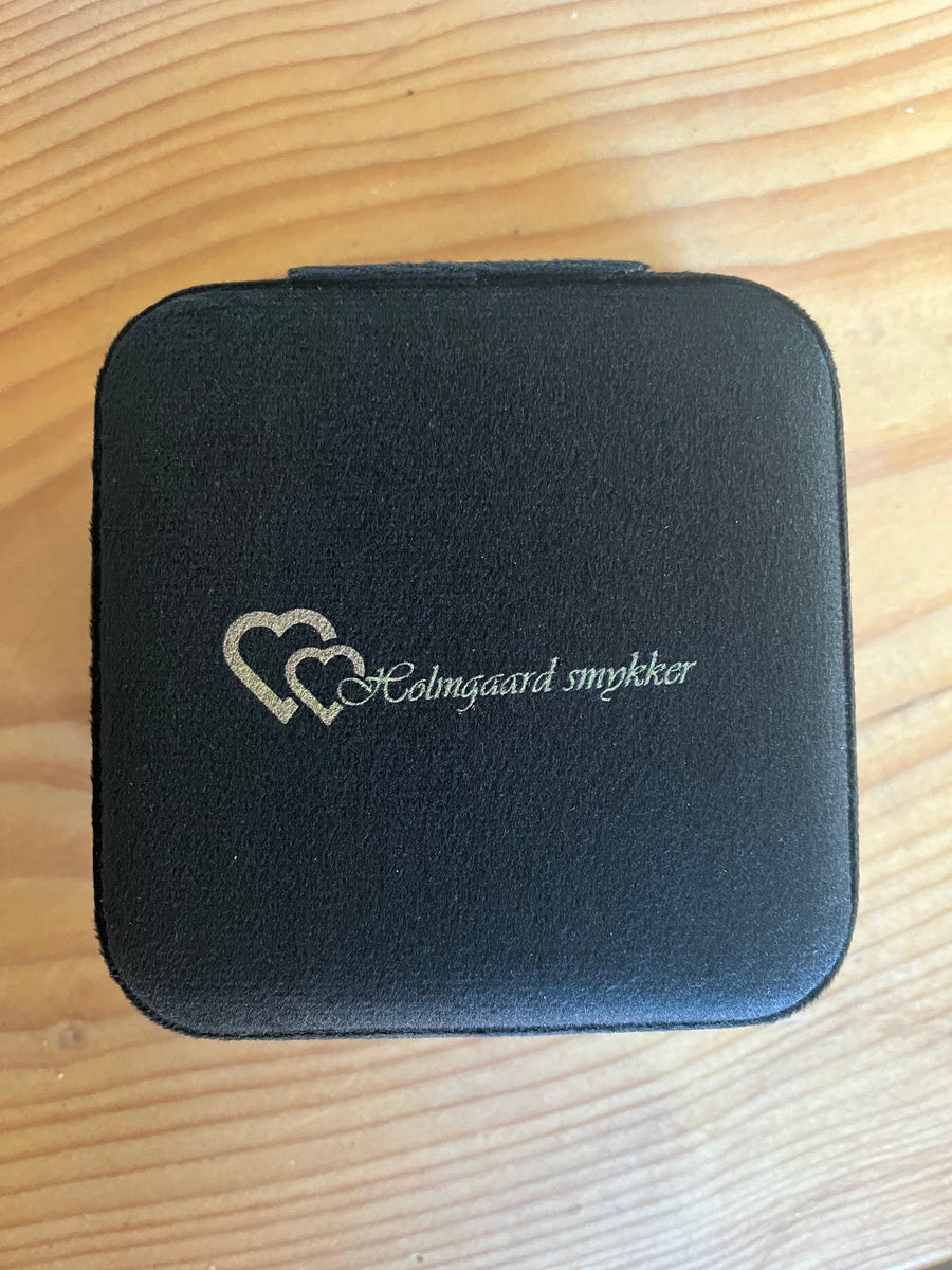 Smykkeskrin Holmgaard Smykker logo